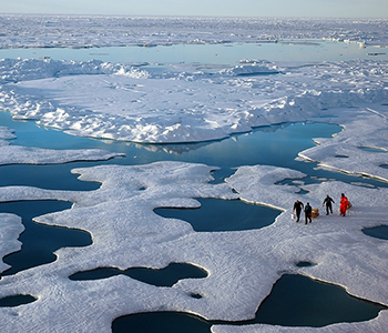 NOAA scientists explore the Arctic during a 2005 mission. CREDIT: Jeremy Potter, NOAA