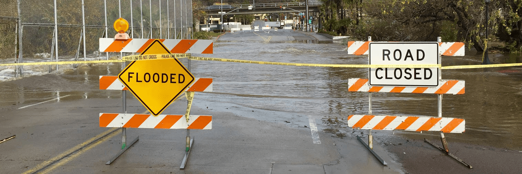 Flooded road closure, Photo credit: USGS