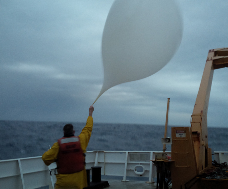 PSL researcher Dan Wolfe launches a balloon from the ship during CalWater 2015 (Credit: NOAA) PSL researcher Dan Wolfe launches a balloon from the ship during CalWater 2015 (Credit: NOAA)