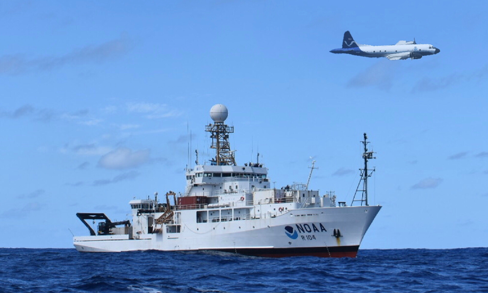 A NOAA P-3 aircraft flying over the NOAA Ship Ronald Brown during ATOMIC