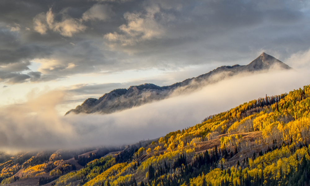 A mountain and low-lying clouds near SPLASH campaign location