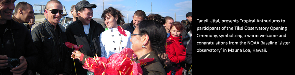 Taneil Uttal presents Tropical Anthuriums to the participants of the Tiksi Observatory Opening Ceremony